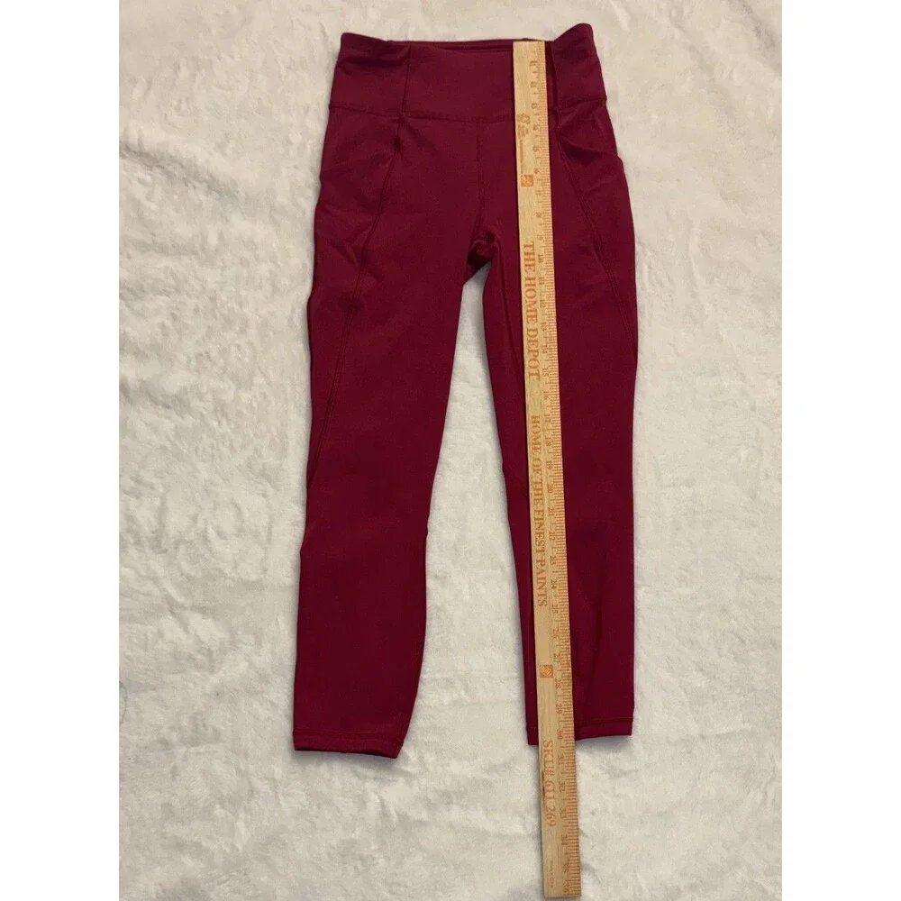 Lululemon Time To Sweat Crops Ruby Red Reflective Cuffs Logo Pockets Size 4